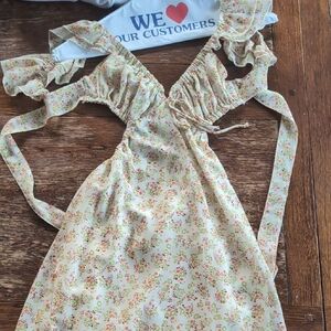 Floral Dress With Cutout Detal And Tie Back